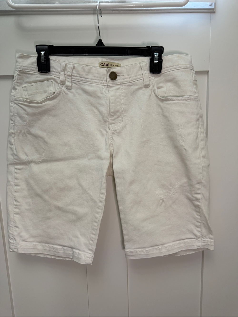 CAbi distressed white jean shorts